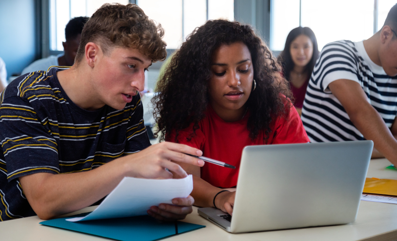 Students collaborating outdoors